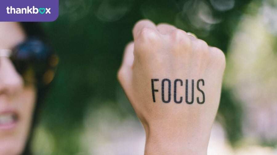 Focus written on hand
