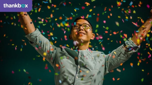 Man celebrating with confetti