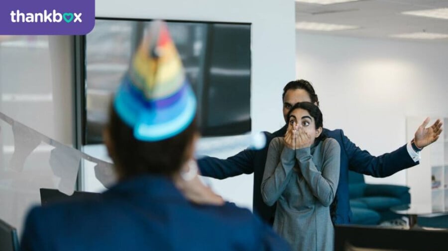An image of a surprise office gathering