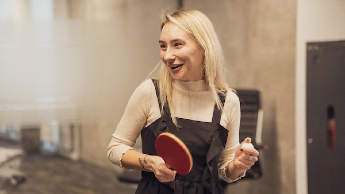 woman playing table tennis