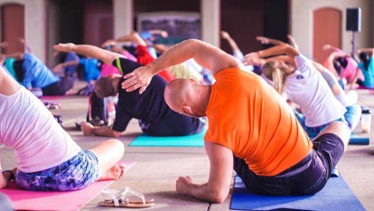 people exercising in the office