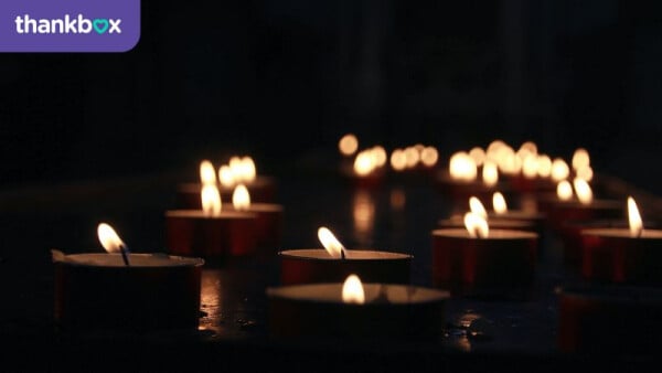 Lit candles of sympathy for someone who has passed