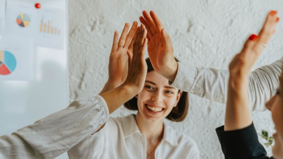 Group of people doing high five