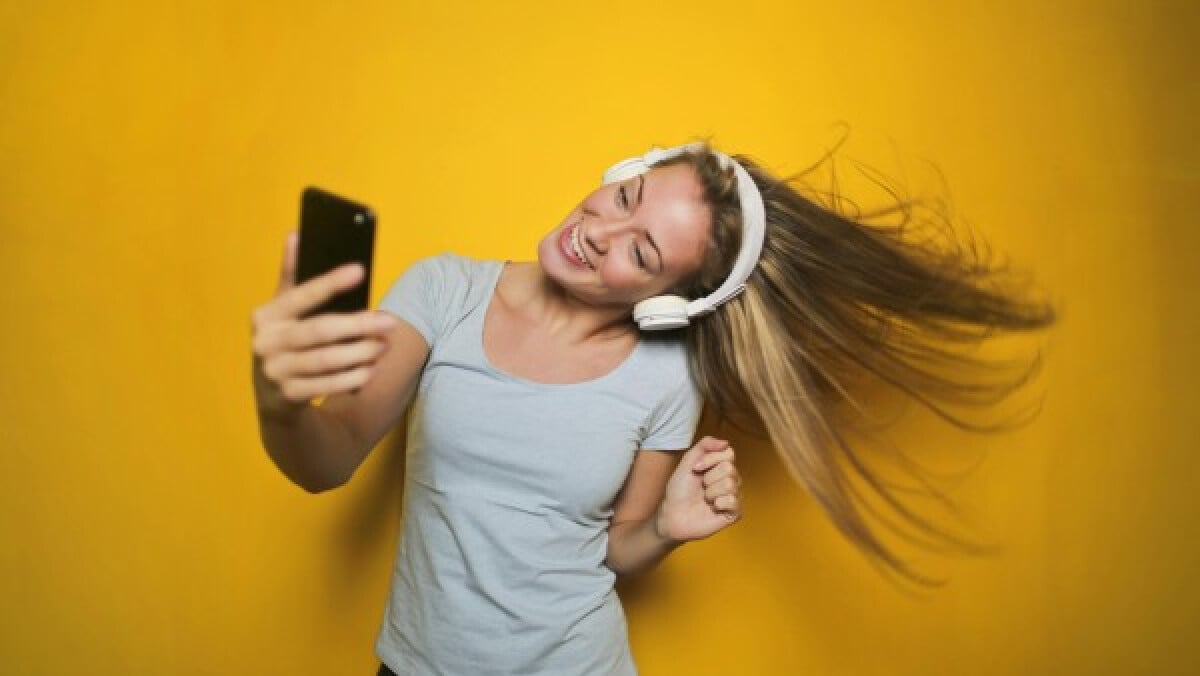 Young woman listening to music
