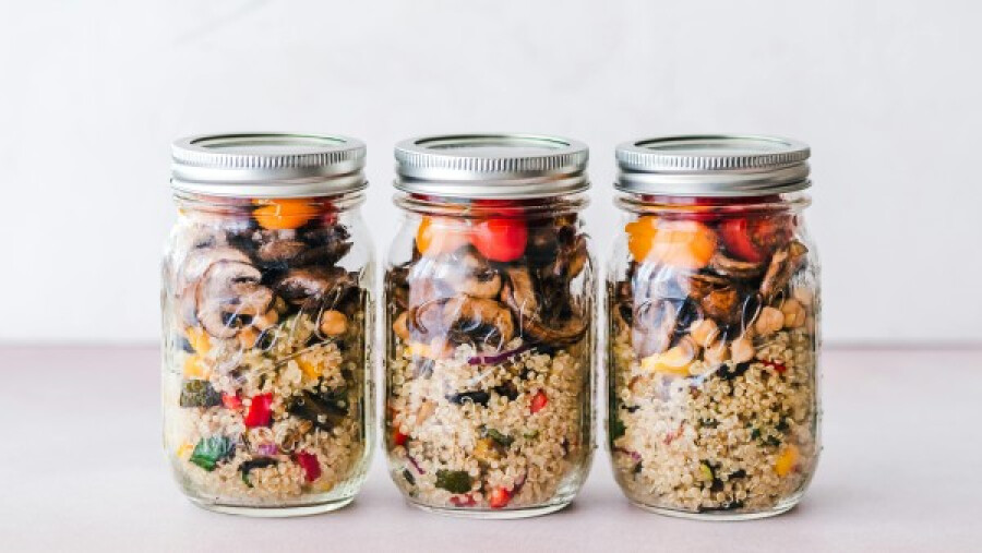 Three Mason jars filled with food