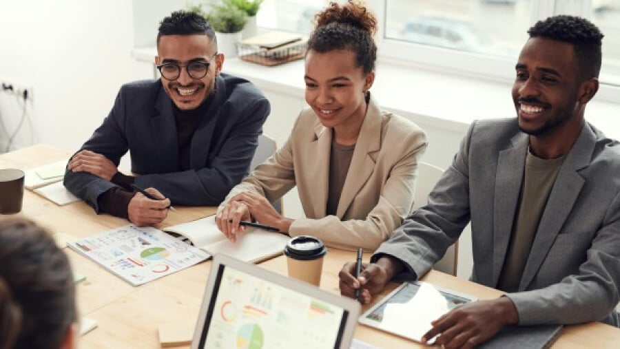 Smiling coworkers in a meeting