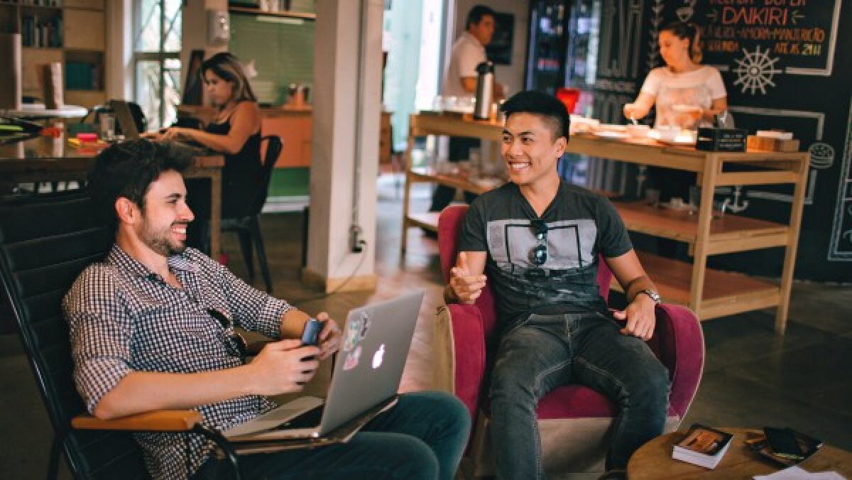 Men having a conversation in a coffee shop