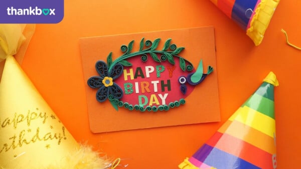 Happy Birthday Greeting Card on Orange Surface