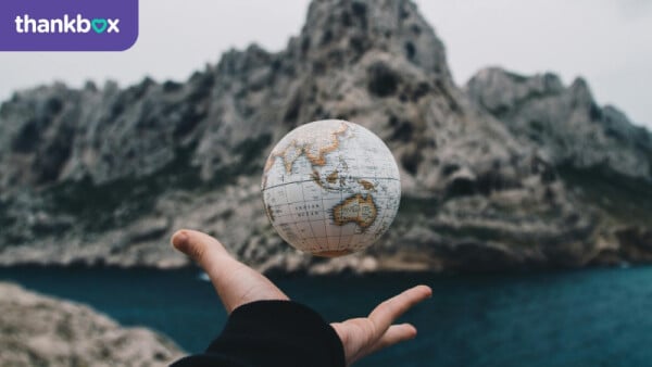 Person Tossing Globe